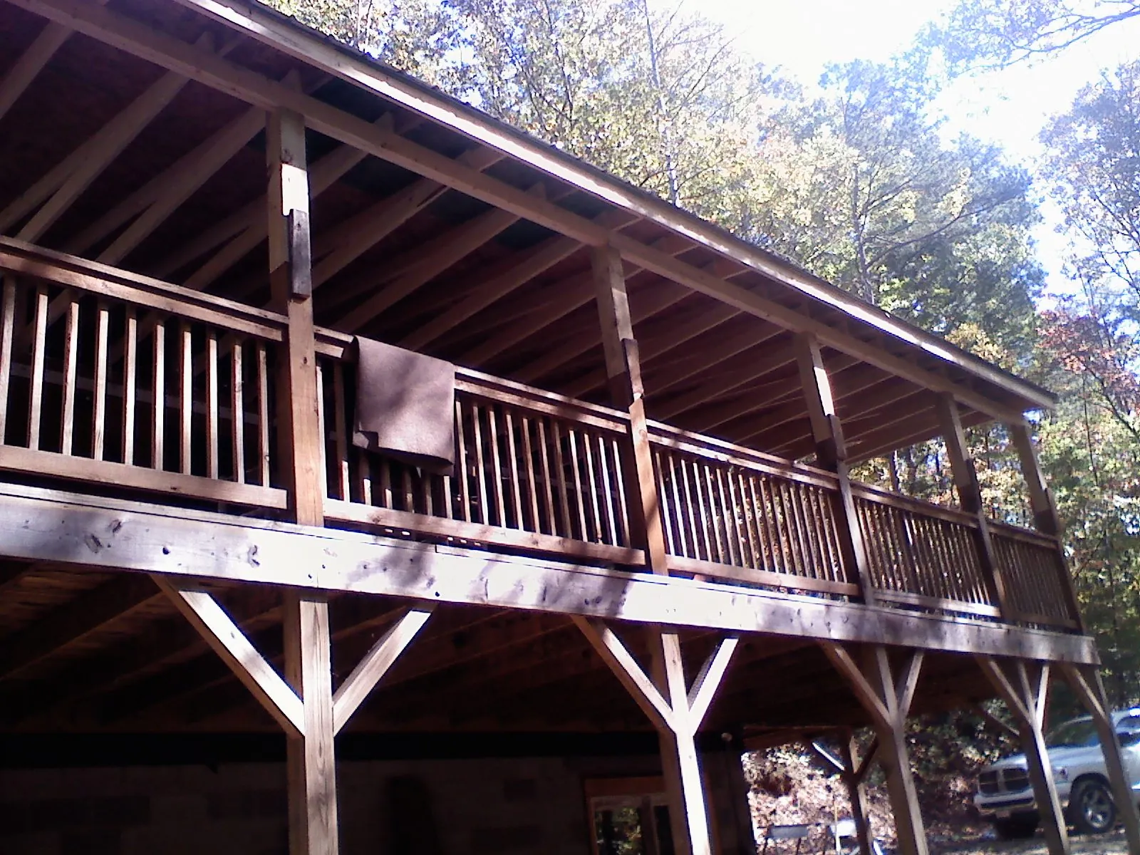 Timber framing under a new elevated porch and deck — Roof Leak Repair in Temperance by Roofing Brothers